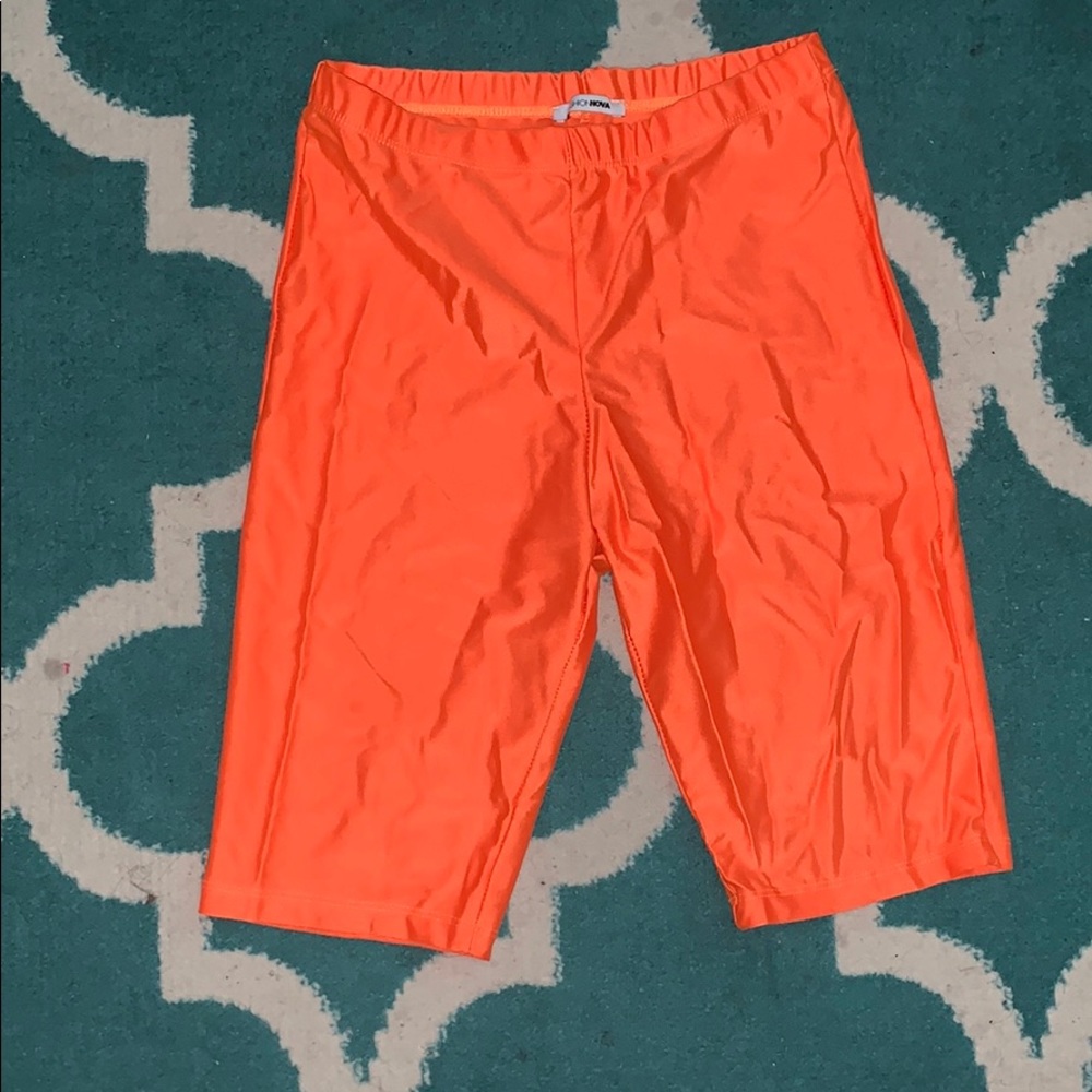 Neon orange biker shorts